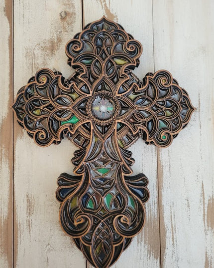 This beauty has stained layers and multiple colors of resin added to the entire cross giving it the stained glass effect.