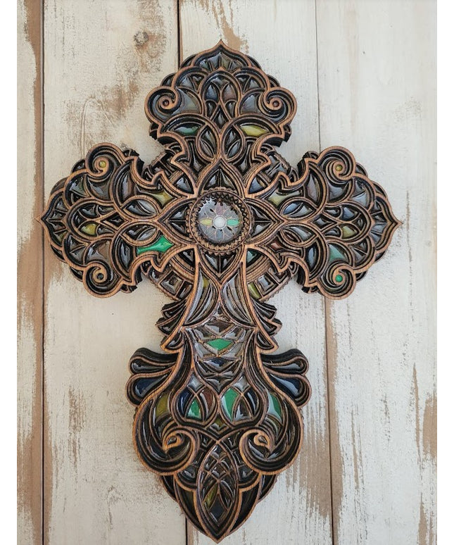 This beauty has stained layers and multiple colors of resin added to the entire cross giving it the stained glass effect.