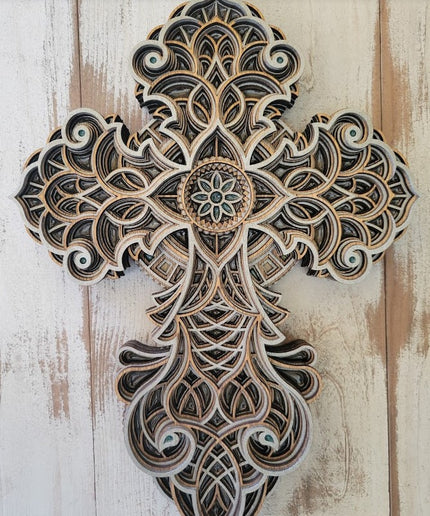 This cross has alternating layers in silver and stain.  Resin is added in the center and random spots within the cross